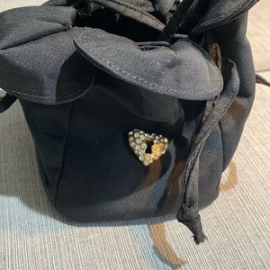 4 leaf clover black purse. Perfect for prom and other dances!